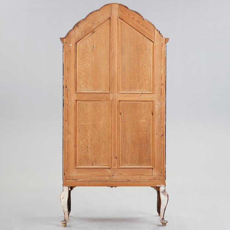 Tor Hörlin, a Swedish Grace decorated oak cabinet, dated 1920.