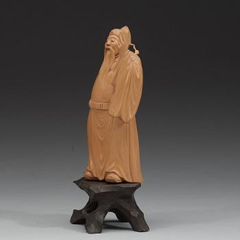 A finely carved boxwood figure of the Tang poet Li Bai (Li Bo, 701-762), late Qing dynasty (1644-1912).