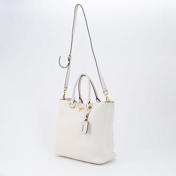 Prada, a white leather handbag.