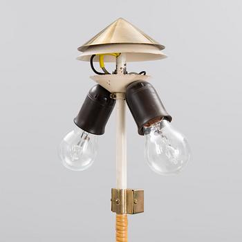 A mid-20th century floor lamp for Taito, Finland.