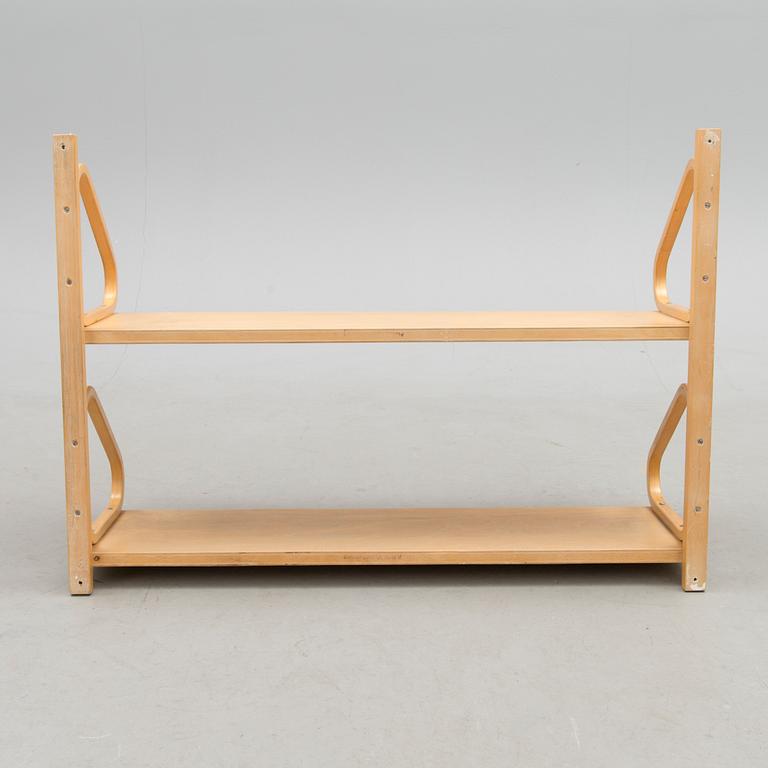 A 112B-2 shelf for Artek.