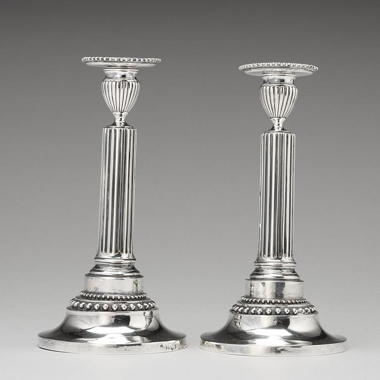 A pair of Swedish Gustavian silver candlesticks, mark of Mikael Nyberg, Stockholm 1788.