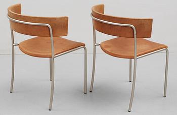 A pair of Erik Karlström steel and brown leather chairs, Stockholm ca 1965.