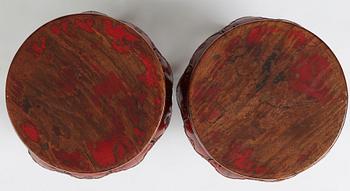 A pair of Chinese red lacquered stools/stands, early 20th century.