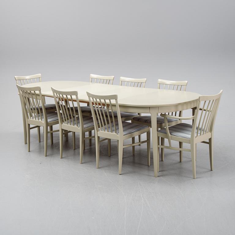 A dining table with two armchairs and six chairs by Carl Malmsten for Bodafors.
