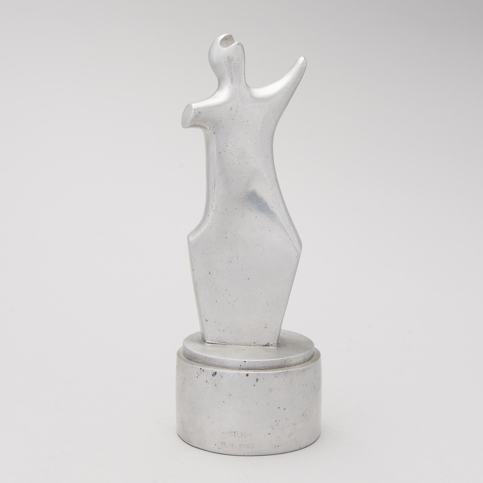 An aluminium sculpture, signed and numbered 5/7, dated -85.
