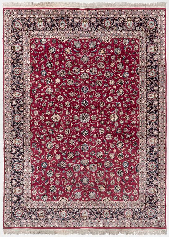 An oriental carpet, a. 378 x 278 cm.