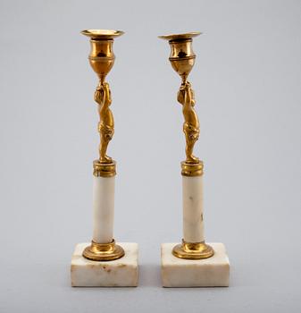 A PAIR OF CANDLESTICKS.