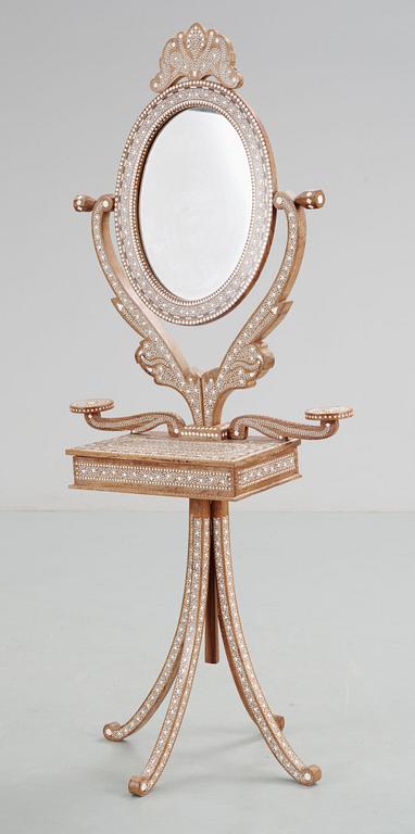 An 20th Century oriental style dressing mirror.