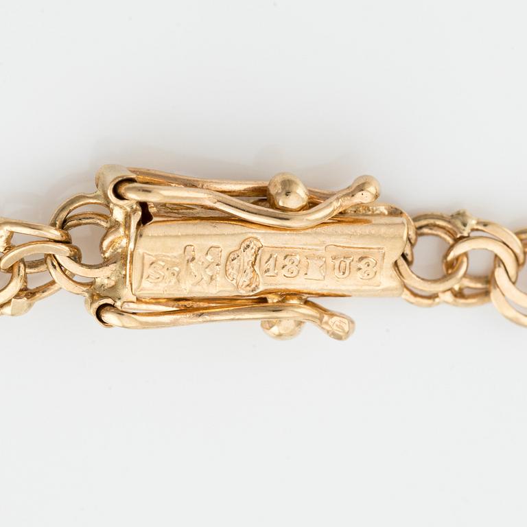 Bracelet, 18K gold, with charms.