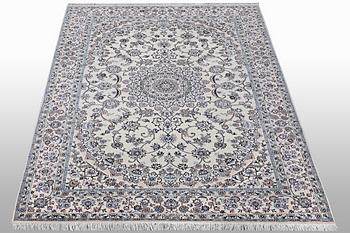 A carpet, Nain, part silk, 6 Laa, ca 250 x 160 cm.
