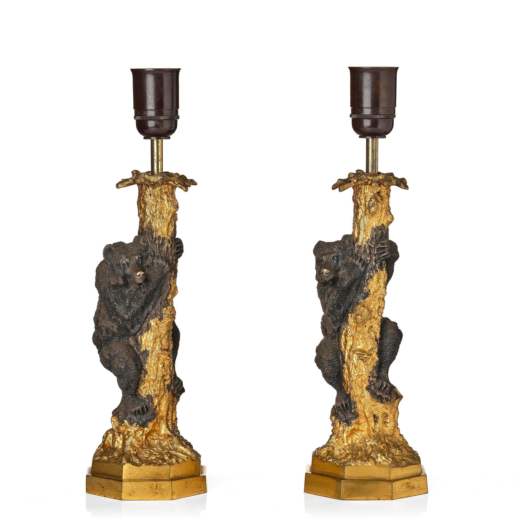 A pair of Russian Alexander III gilt and patinated bronze table lamps, late 19th century.
