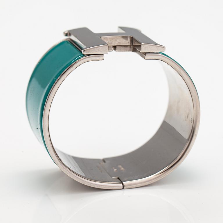 Hermès, A "H click" bracelet made of metal and enamel. Marked Hermès, S, Made in France.