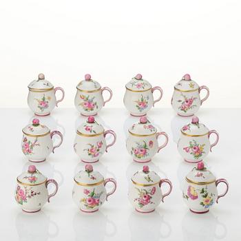 A set of 12 Swedish Marieberg custard cups with covers, 18th century.