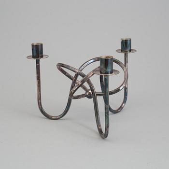 JOSEF FRANK, a brass candelabrum from Svenskt Tenn.