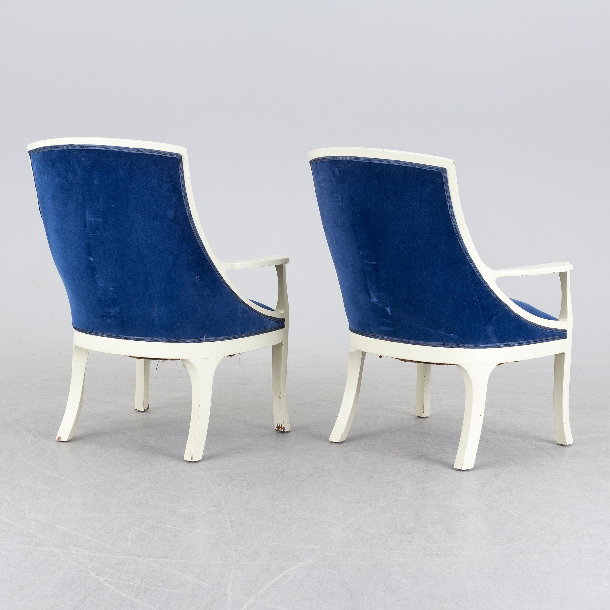 A pair of art nouveau armchairs.
