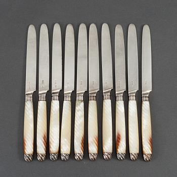 An English set of ten early 19th century silver and mother of pearl chees /fruit knifes.