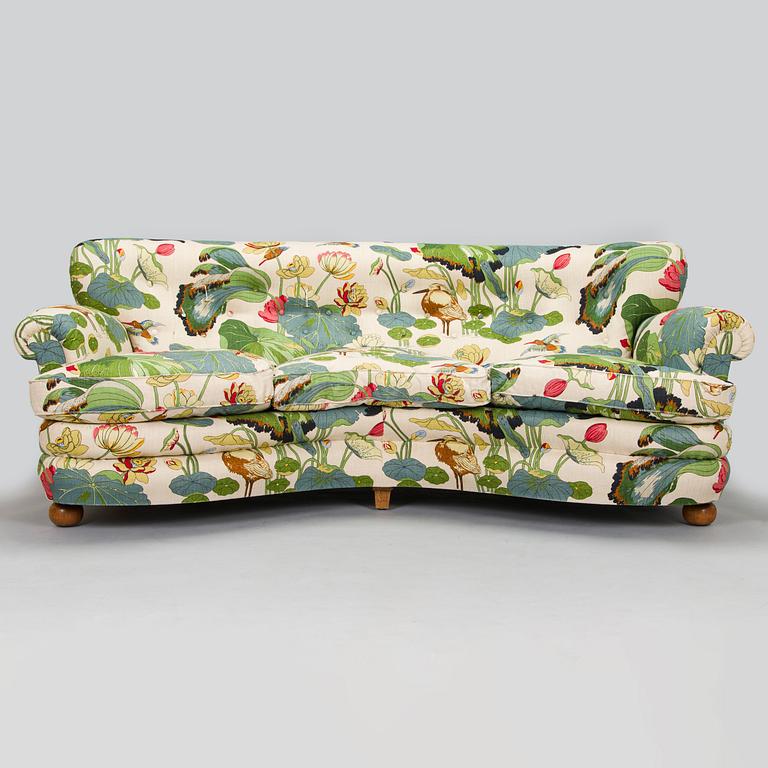 A model 968 sofa by Josef Frank for Firma Svenskt Tenn.