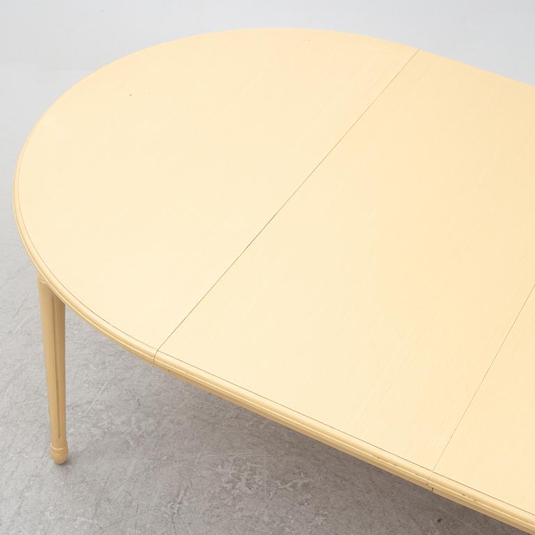 A Gustavian style dining table with six dining chairs, Sweden, 21st century.