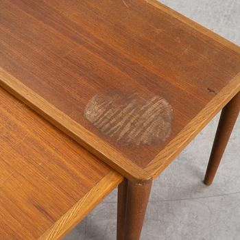 A four piece nesting table, mid 20th century.