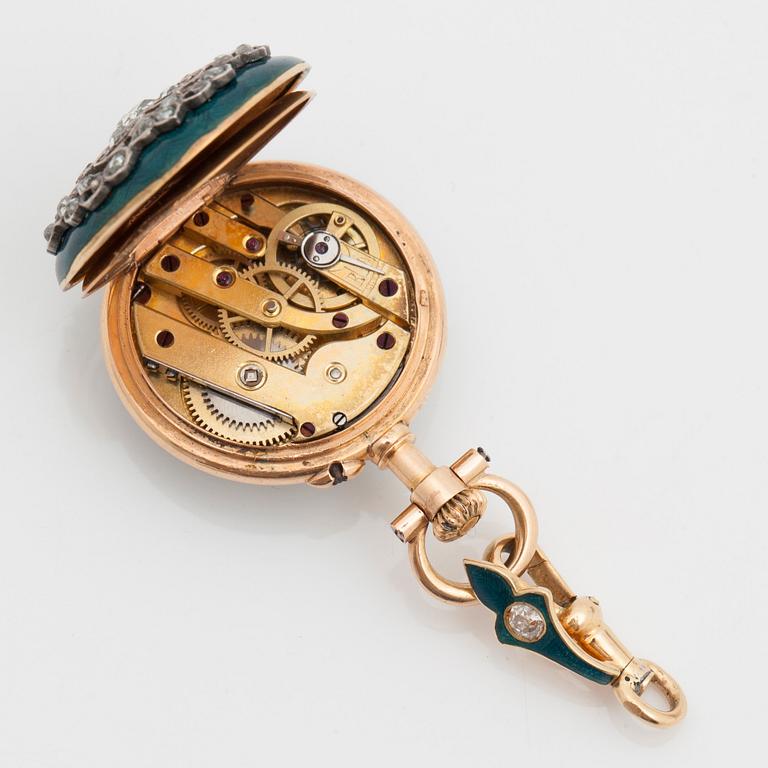 A ladies watch that can be worn as a brooch. Enamel set with diamonds. Cylinder escapement. Circa 1890-1900.