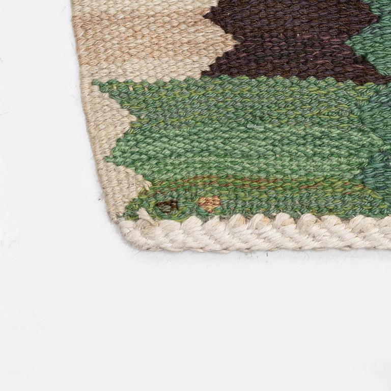 Barbro Nilsson, a carpet 'Nejlikan grön', flat weave, c. 390 x 278 cm, signed AB MMF BN.