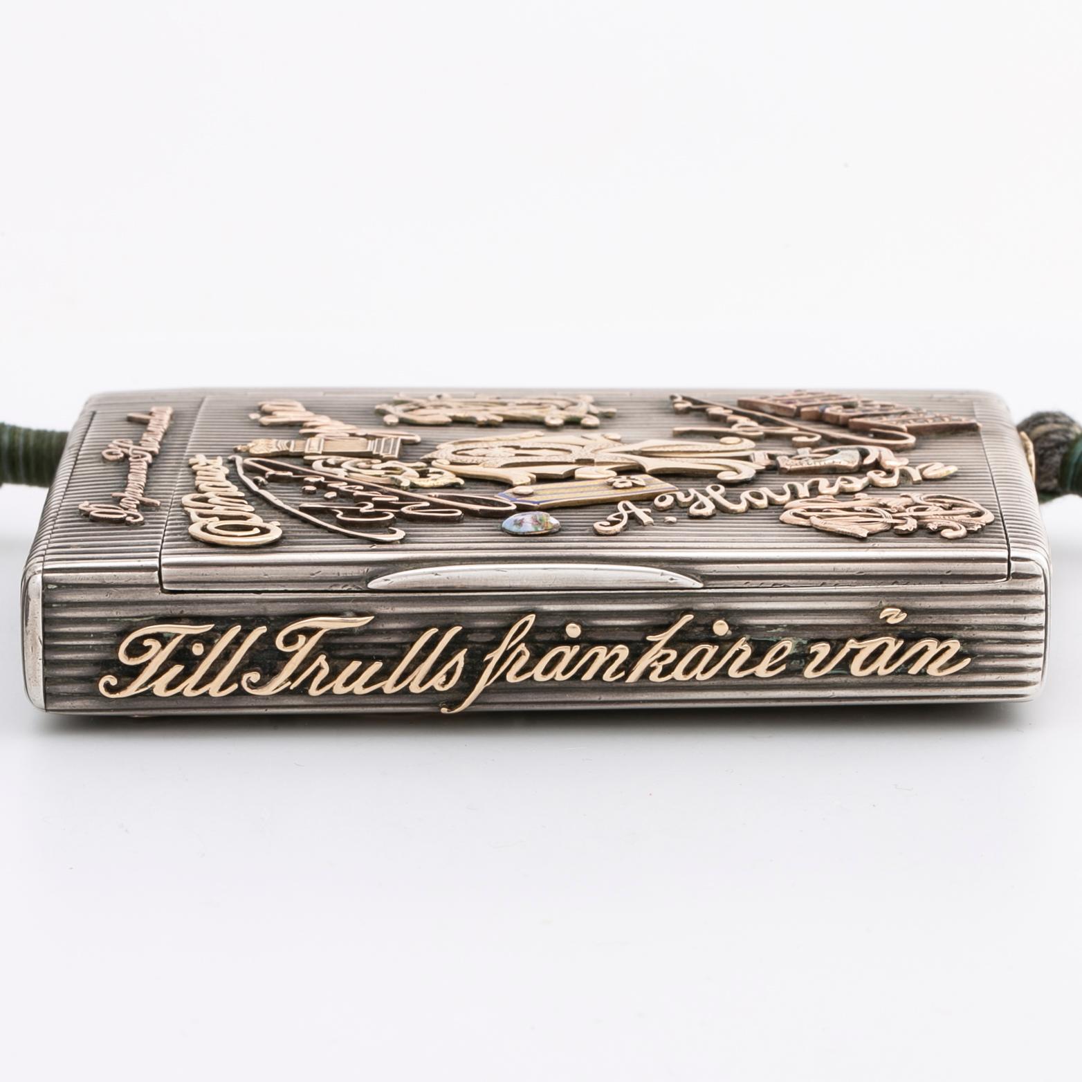 Silver box, gold, enamel, rose-cut diamonds, saphires and rubies (possibly synthetic), silk chord, St Petersburg.