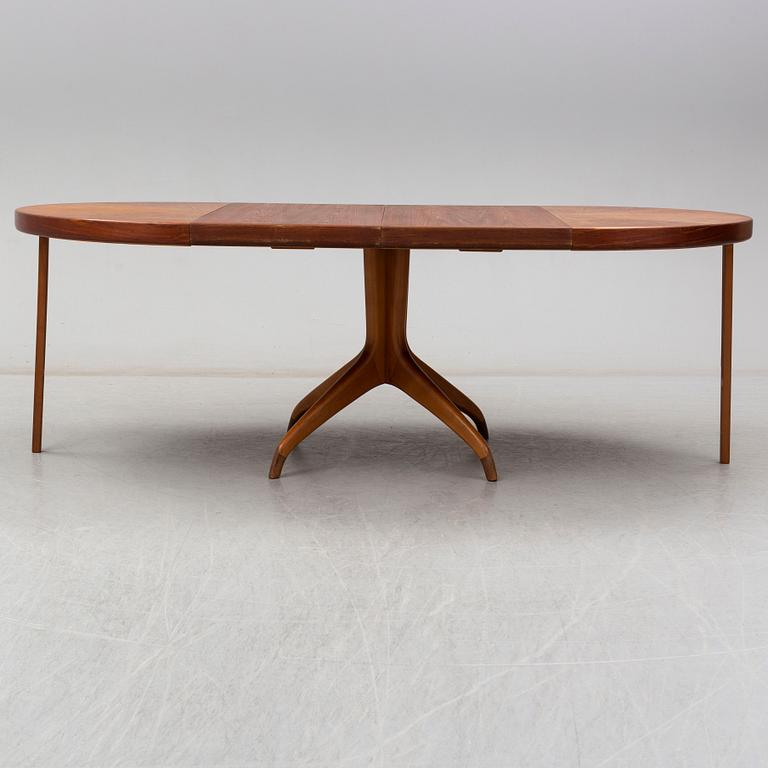 A teak and beech dining table and 6 chairs. Mid 20th century.