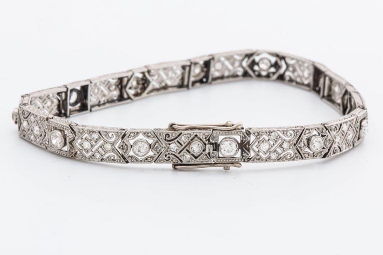 DIAMOND BRACELET, probably platinum, old and rose-cut diamonds approx 2 ct in total, 1 large stone not diamond.