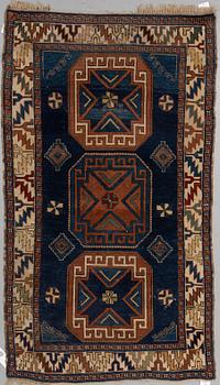 A RUG, a semi-antique Caucasian, ca 175 x 102 cm.