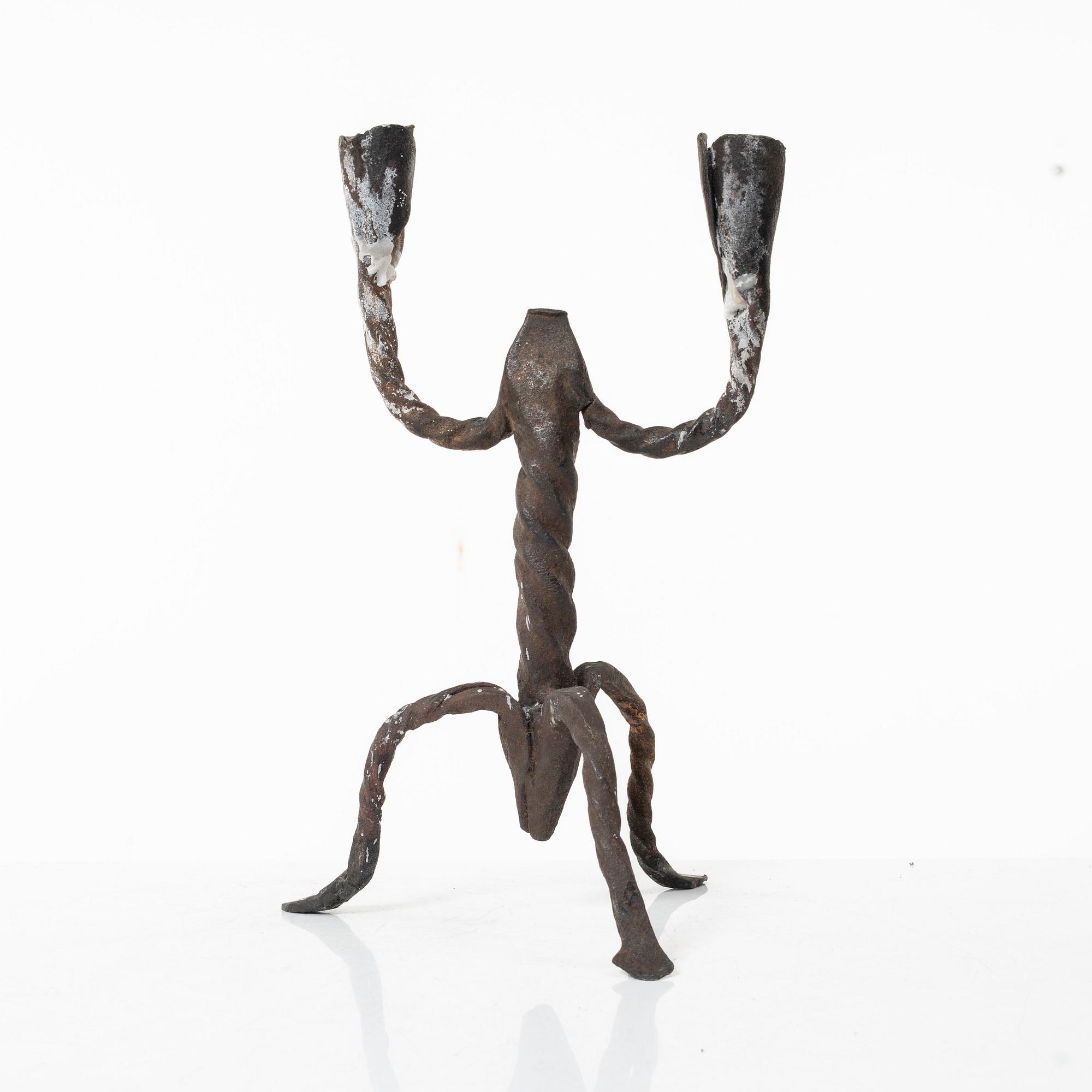 A two-light wrought iron candlestick, Sweden, 18th / early 19th century.