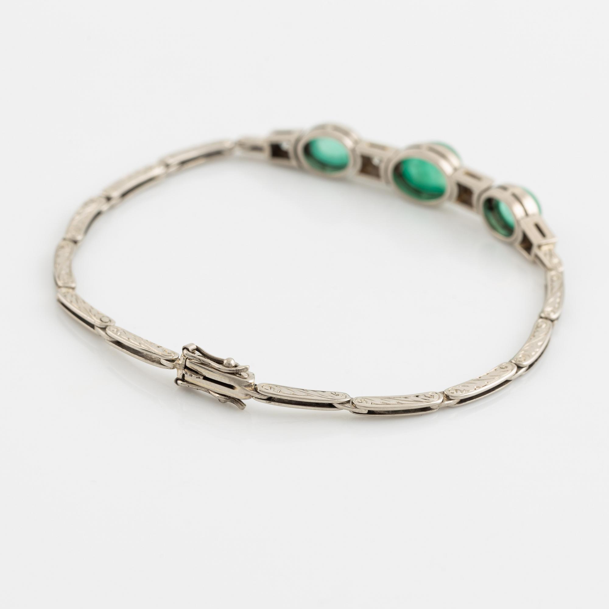 Cabochon cut emerald and brilliant cut diamond bracelet.