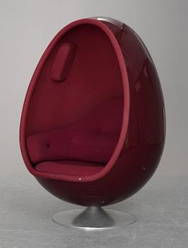 A Thor Larsen burgundy "Ovalia" chair, Torlan, Staffanstorp, Sweden 1960's.