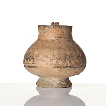 A central Asian pottery jug 12th-13th century.