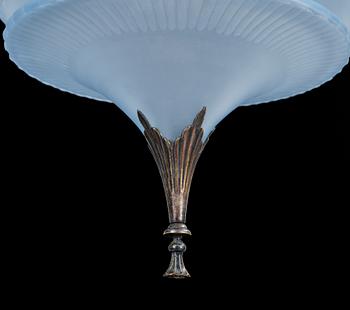 A Simon Gate light blue glass and silver plate chandelier by Orrefors, ca 1925.