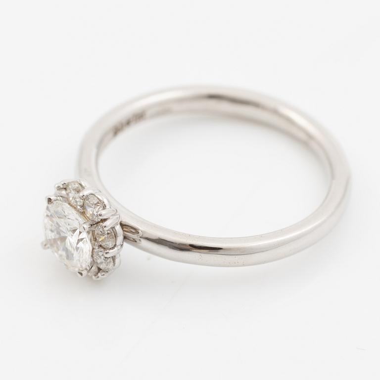 Ring 18K white gold set with a brilliant-cut diamond, accompanied by an IGI report.