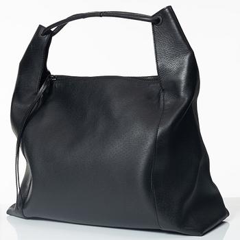Gucci, A black leather hobo bag.
