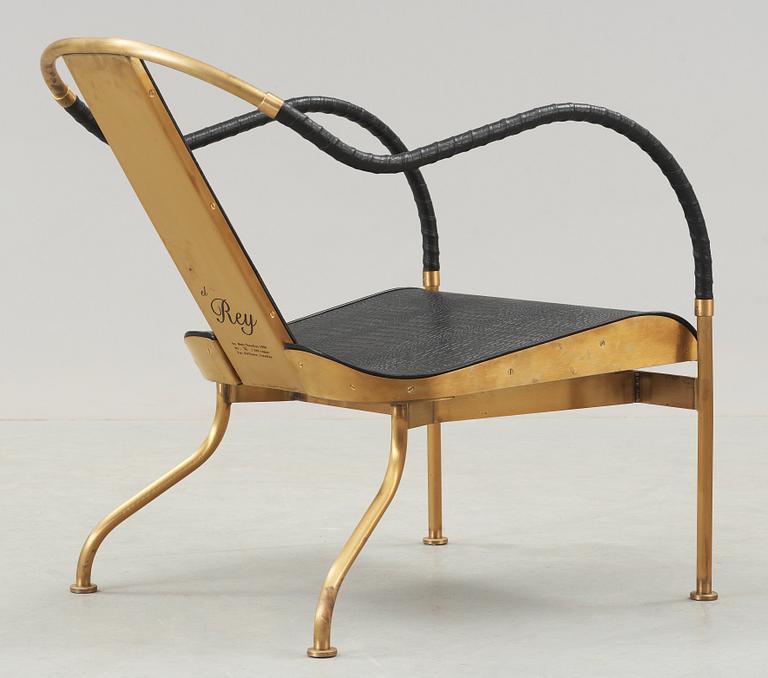 A Mats Theselius 'El Rey' brass and leather easy chair, by Källemo, Sweden.