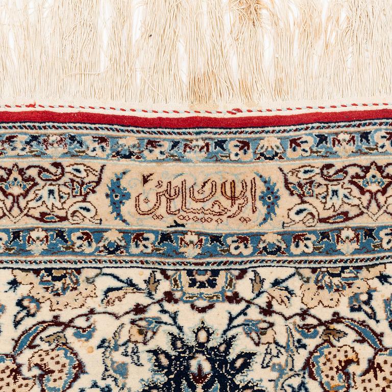 A semi-antique Nain Tusheshk, signed, ca 324 x 223 cm.