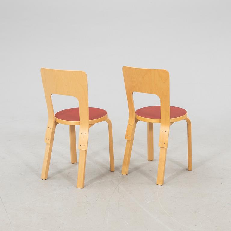 Alvar Aalto, a pair of model 66 chairs, Artek 2008.