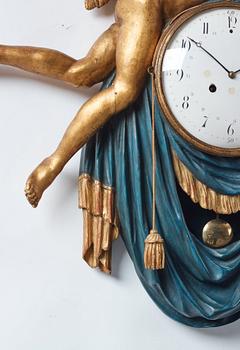 A Swedish Empire early 19th century gilt wood wall clock.