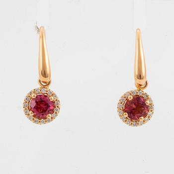 Pink tourmaline and brilliant-cut diamond earrings.