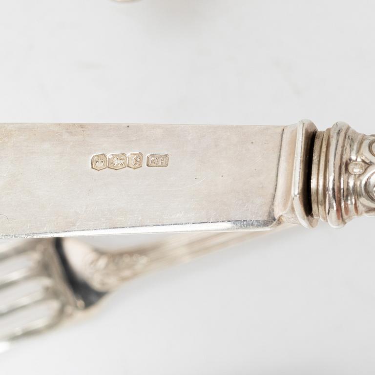 A silver cutlery set and wood case, mark of Émile Puiforcat and others, Paris, France 1850s-1900s.