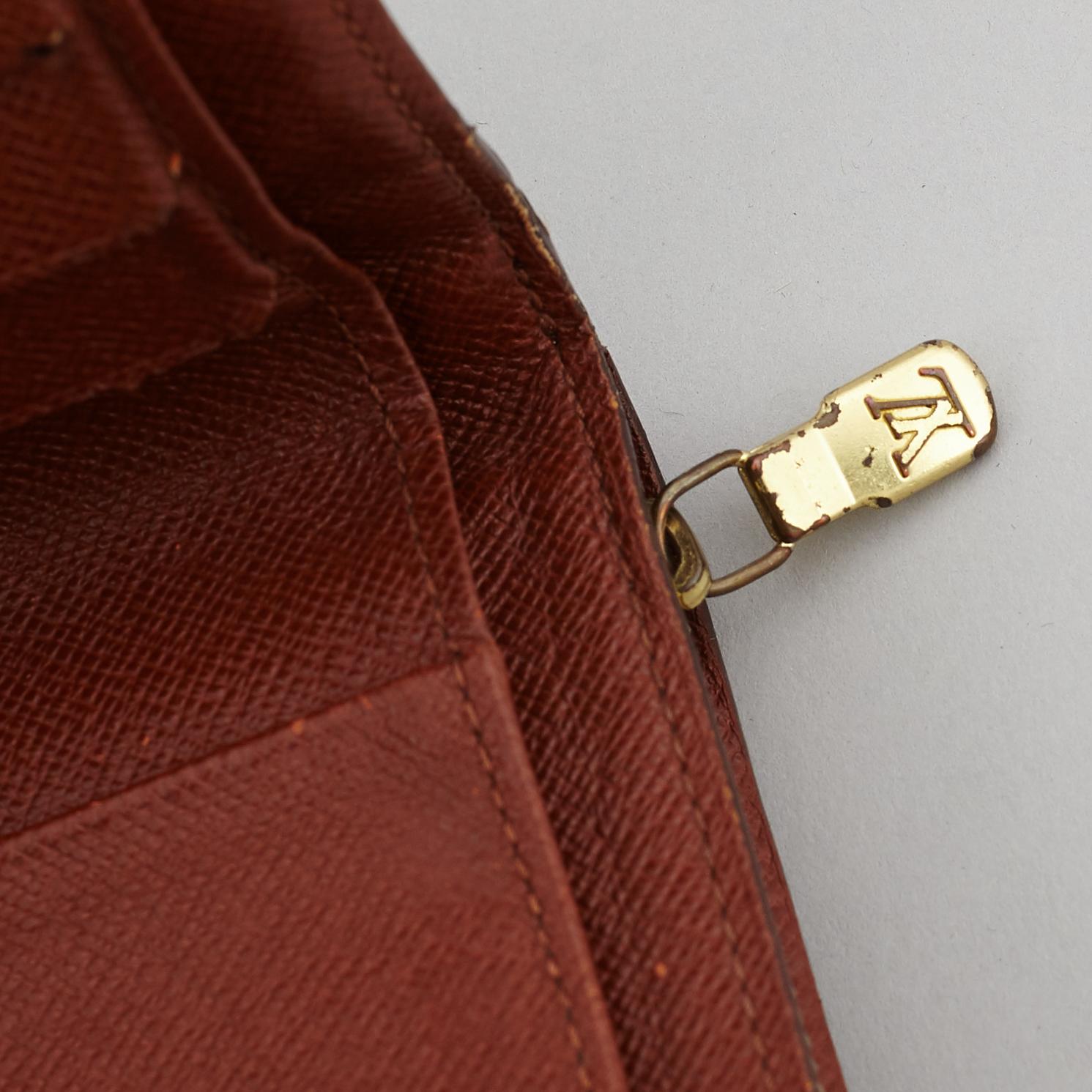 LOUIS VUITTON, a monogram canvas wallet.