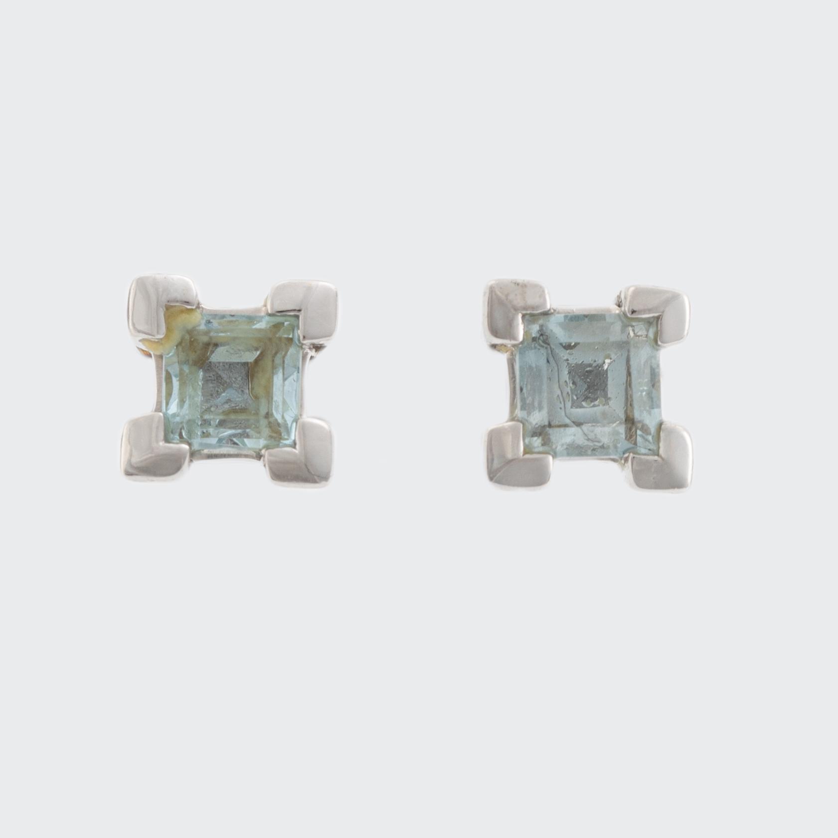 Ring, pendant, and a pair of earrings, 18K white gold with topaz and small diamonds.