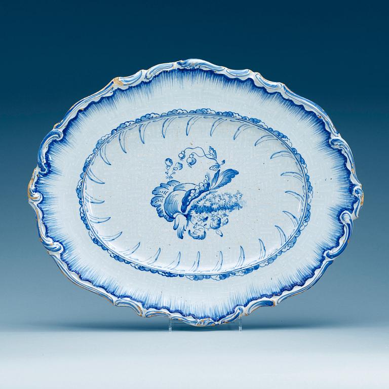 A Swedish Rörstrand faience charger, dated 17/11 (17)64.