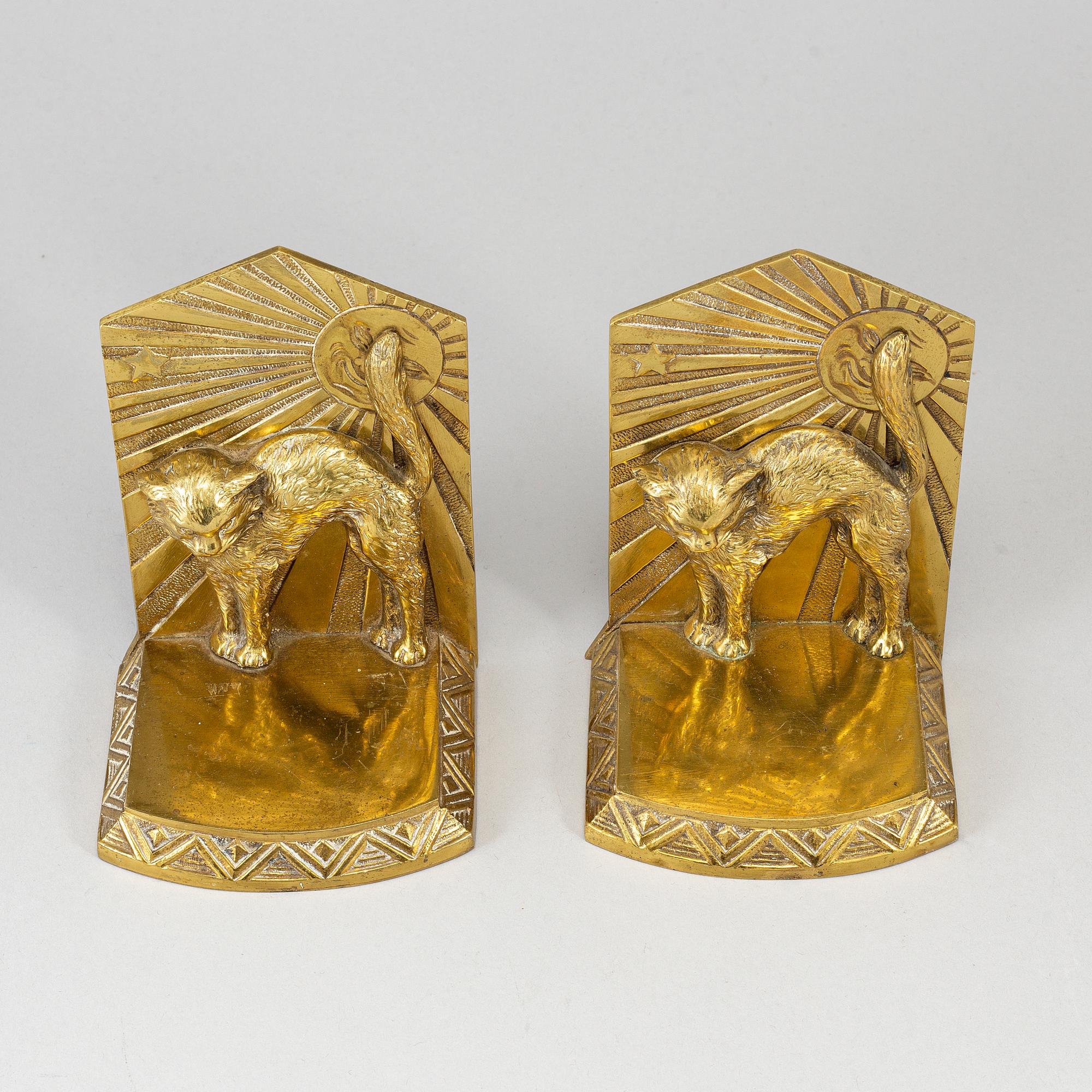 A pair of art déco bronze book ends, 1930s.