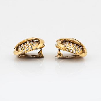 Chanel, a pair of gold tone and rhinestone clip-on earrings.