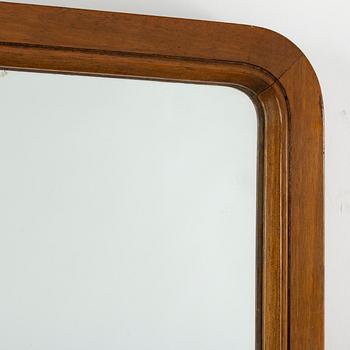 A 1940s Swedish Modern mirror.
