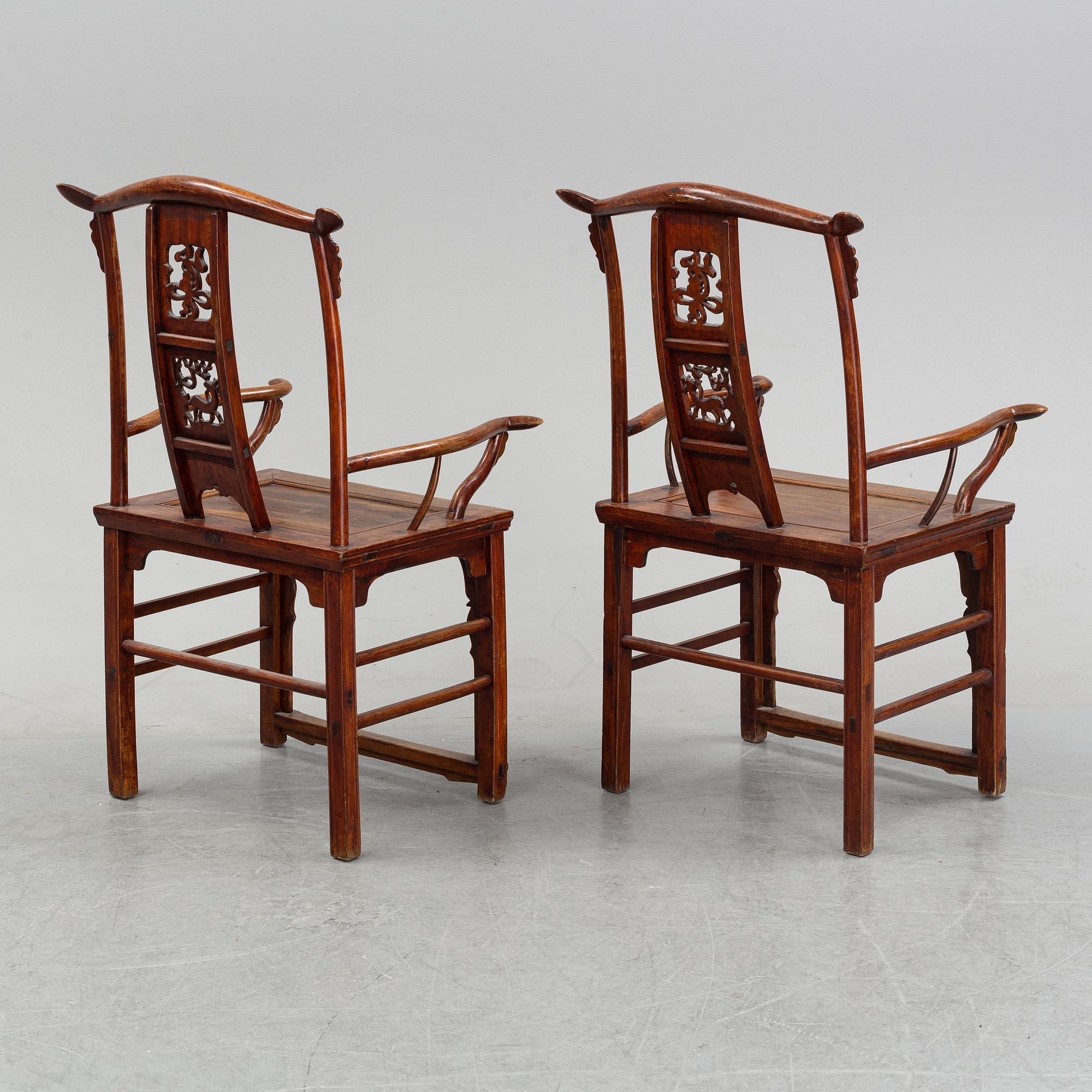 A pair of chinese armchairs, 20th century.